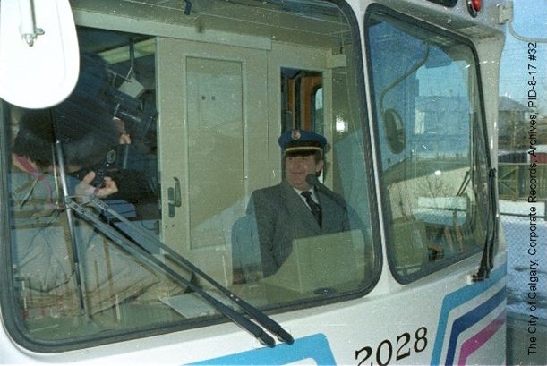 Mayor Ralph Klein at the helm of the CTrain on opening day – May 25, 1981. Photo Credit: City of Calgary Archives