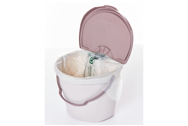 Line the pail with a compostable bag